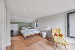 Bedroom One- click for photo gallery